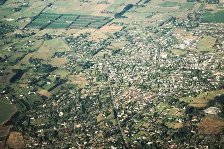 an aerial view of a town in the middle of the country