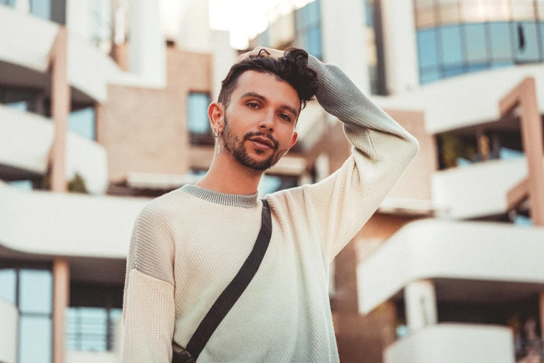 a person wearing a tie in front of a building