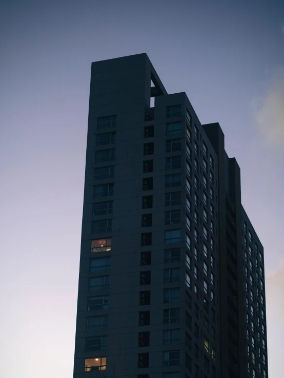 the sun is shining brightly in front of an office building