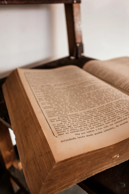 an open book sitting on top of a desk