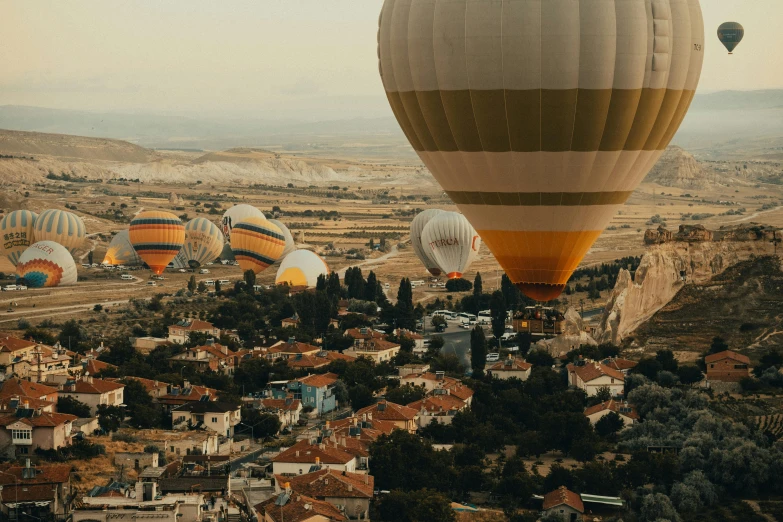 many  air balloons floating over the city