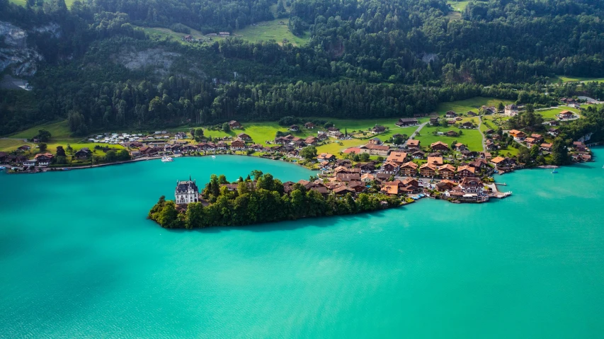 an aerial view of a lakeside resort in the ocean