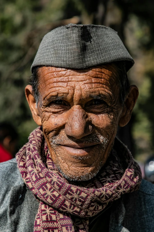 a man with a hat and a scarf on