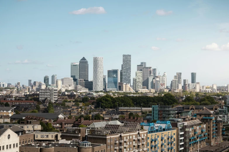 a city skyline with high rise buildings in the foreground