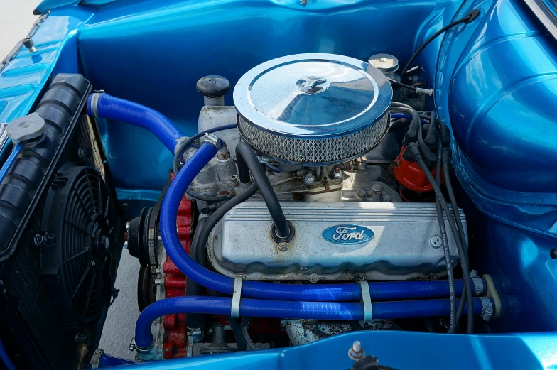 the engine of a classic ford mustang