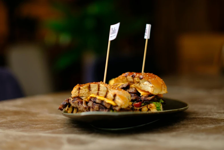 a plate with a tasty looking sandwich that is placed on a table