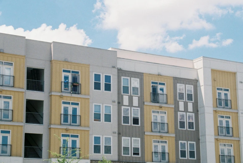 an apartment building with multiple balconies and balconies