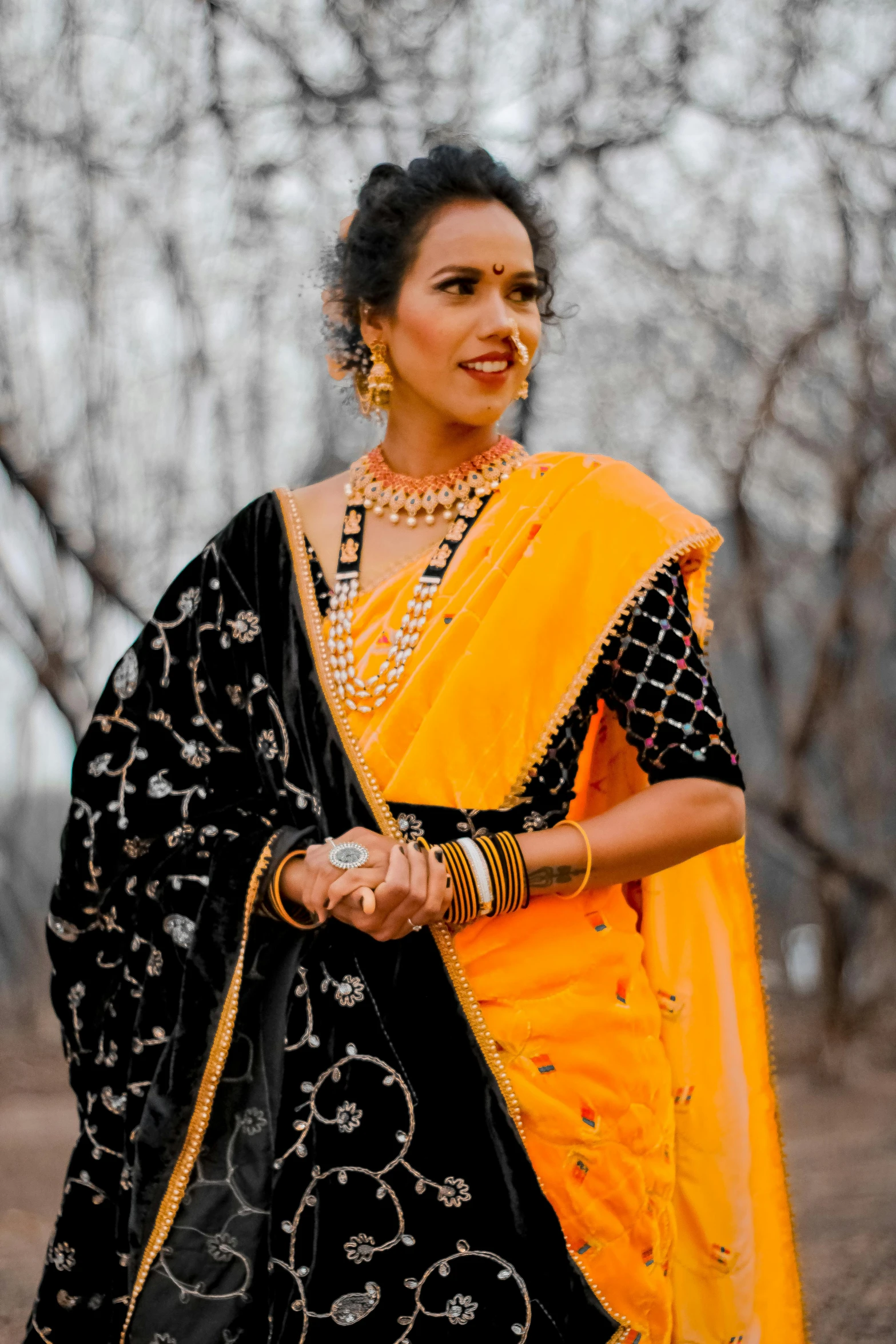 woman in an indian traditional yellow sari