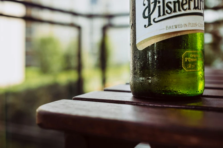 a bottle of beer is on the table