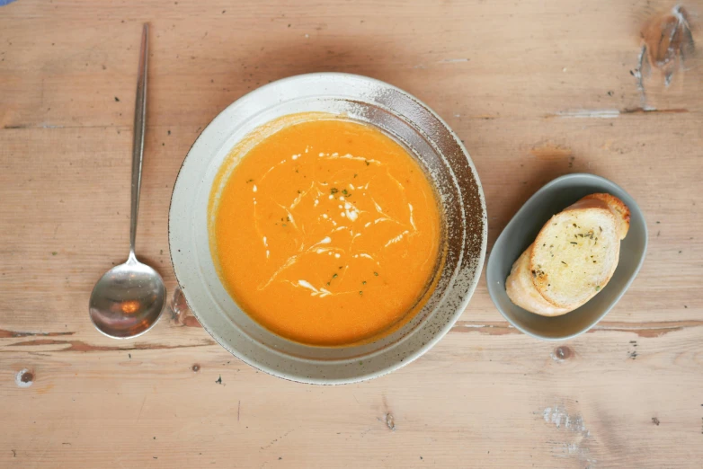 the soup is made from tomato sauce in a bowl