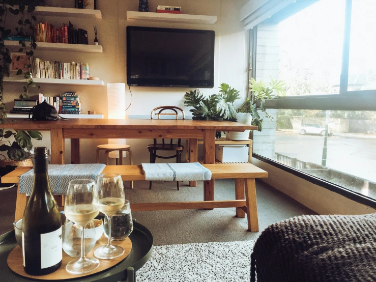 some wine bottles and glasses on a table