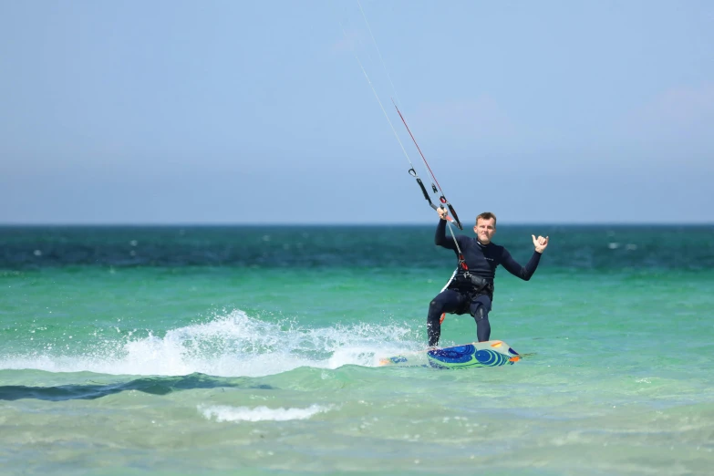 a man is surfing in the open ocean waters