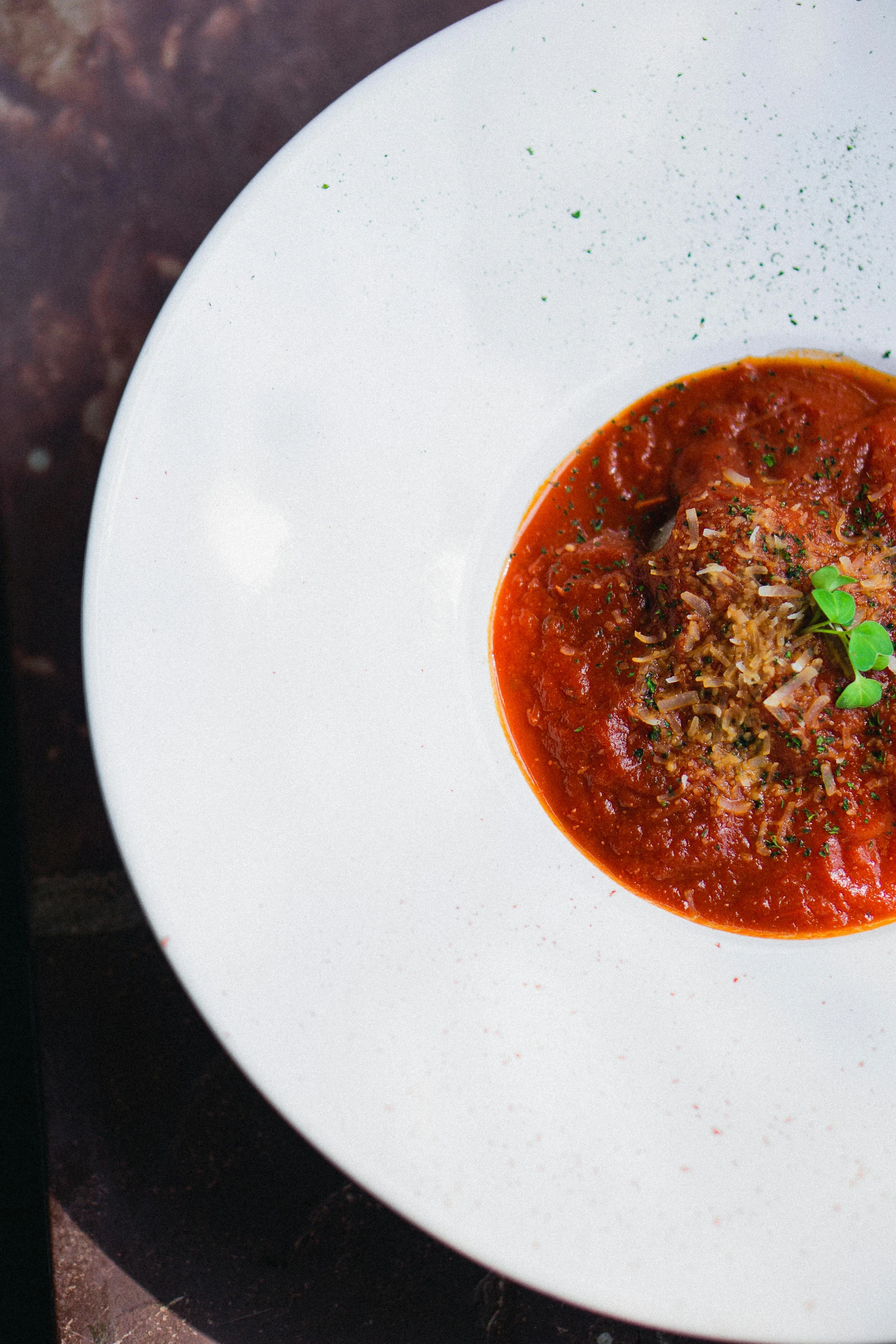 a close up of a plate with a chili