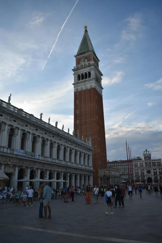 a tall brick tower sitting on top of a building