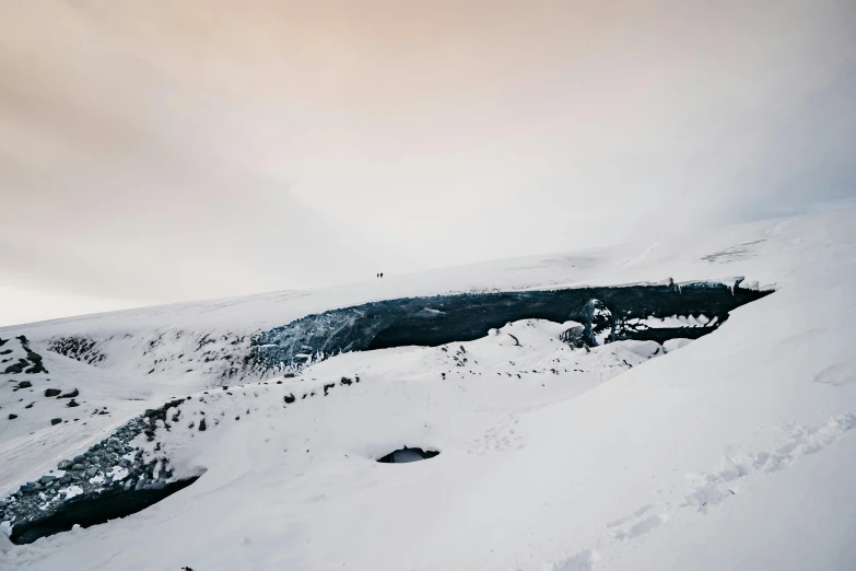 there are some people skiing down this mountain