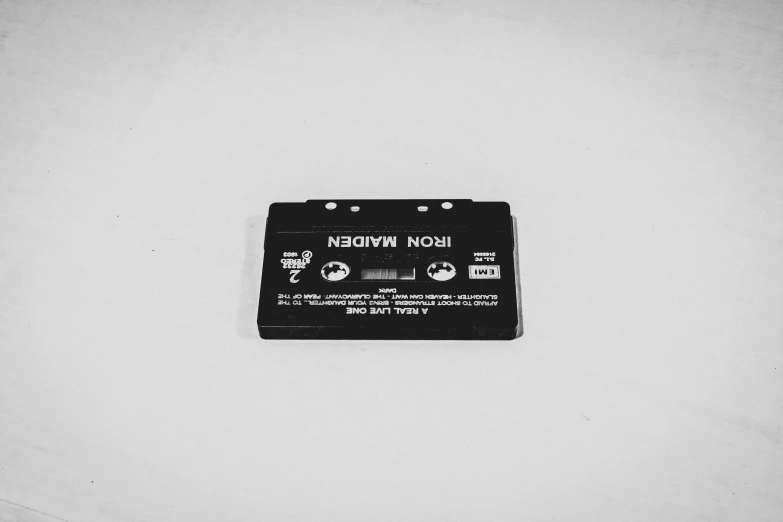 an old black and white po with a cassette label