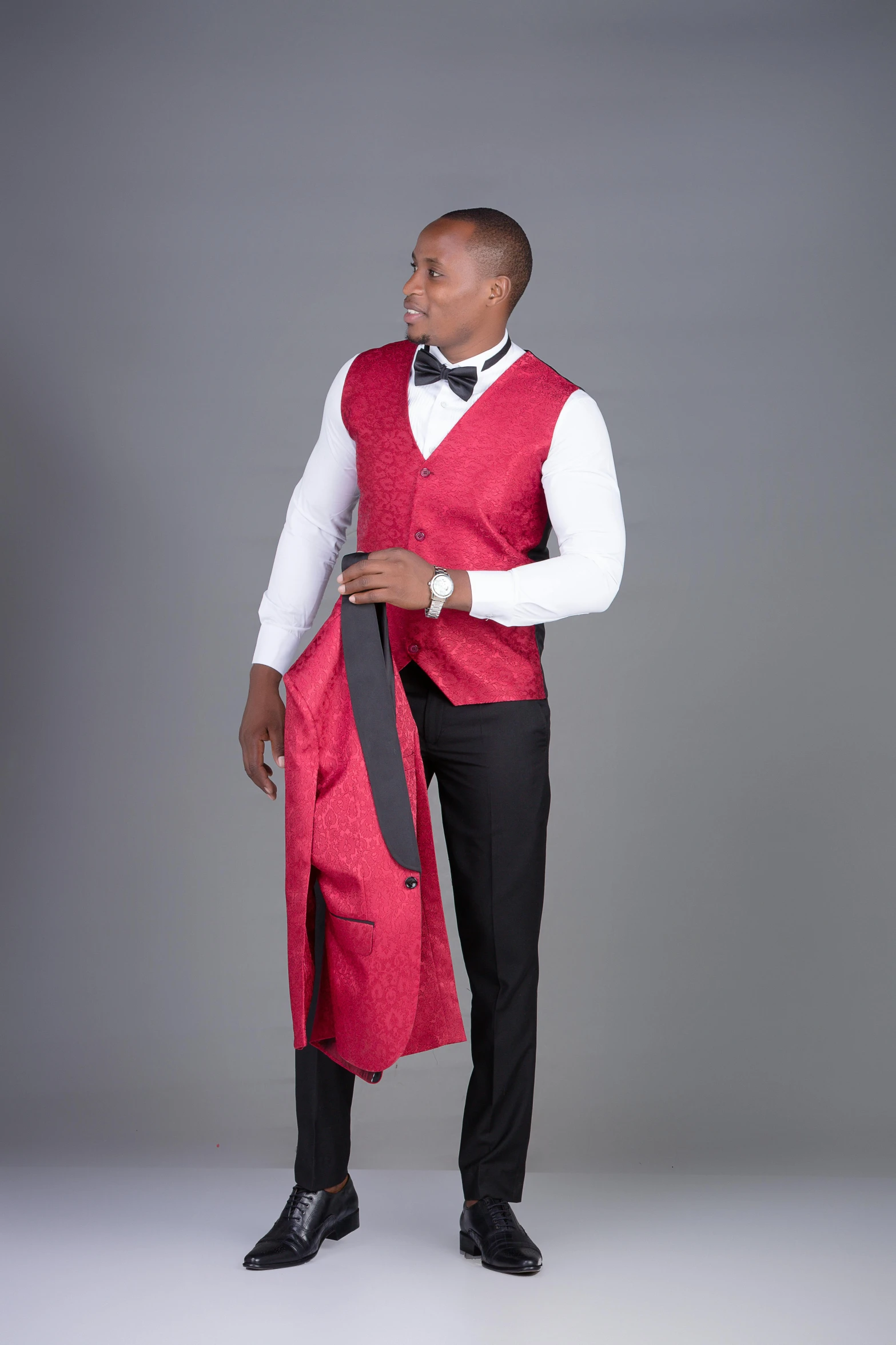 an image of man in formal dress clothes posing