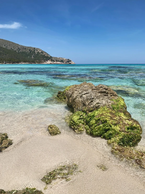 an image of a beach scene taken from the water