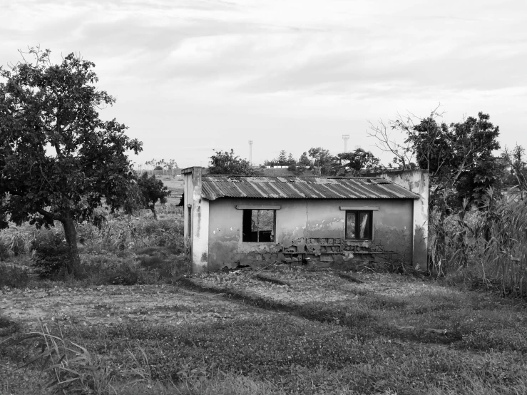 a black and white picture of an abandoned building