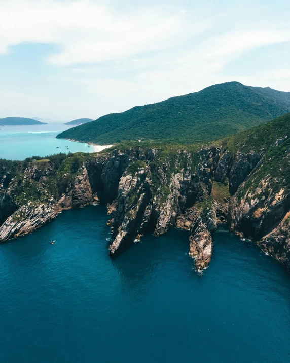 a large body of water near a cliff