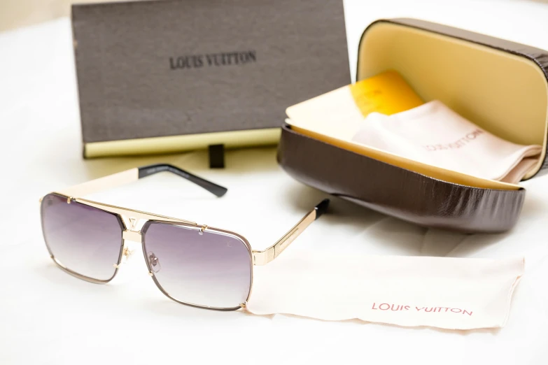 a small sunglasses sitting inside a box