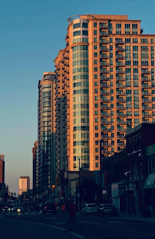 the large tall buildings are behind the tall buildings