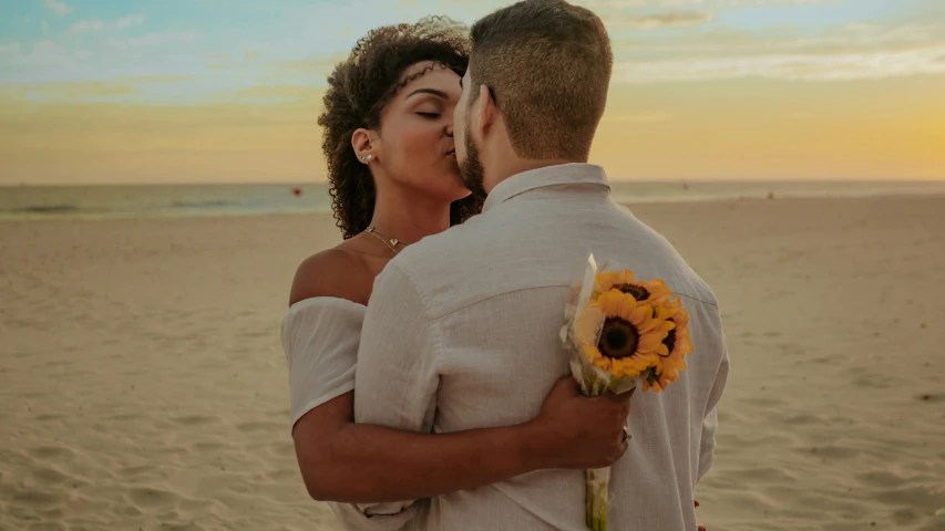 a man kissing a woman in the nose