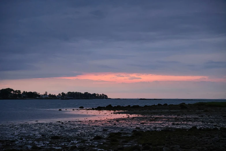 a dark water inlet that leads to several small islands