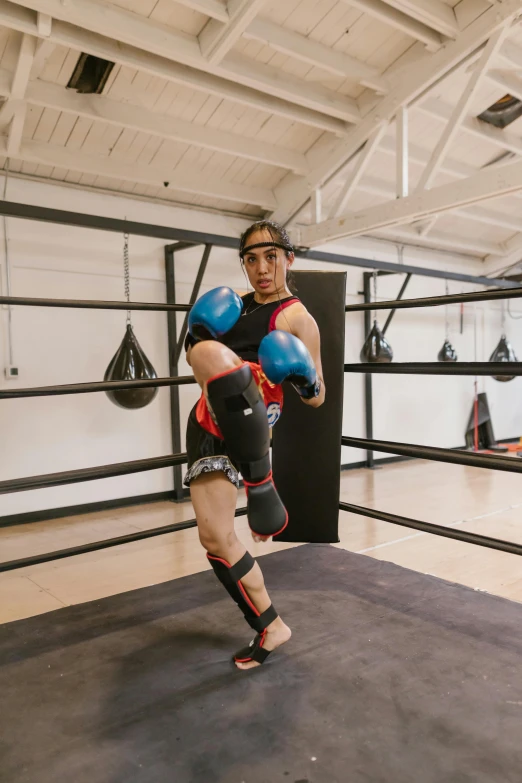 the man is practicing his moves in the ring