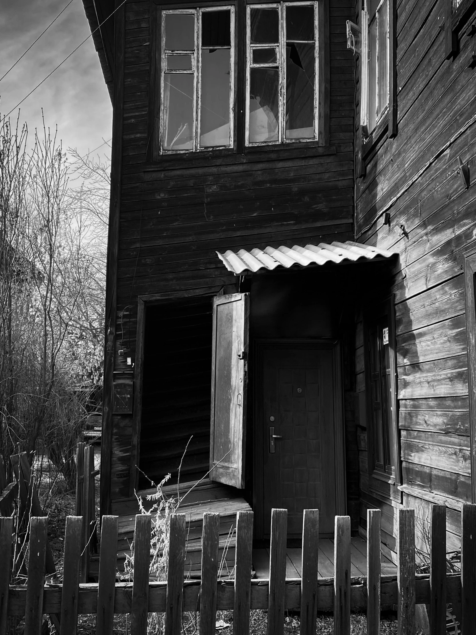 black and white pograph of a small house