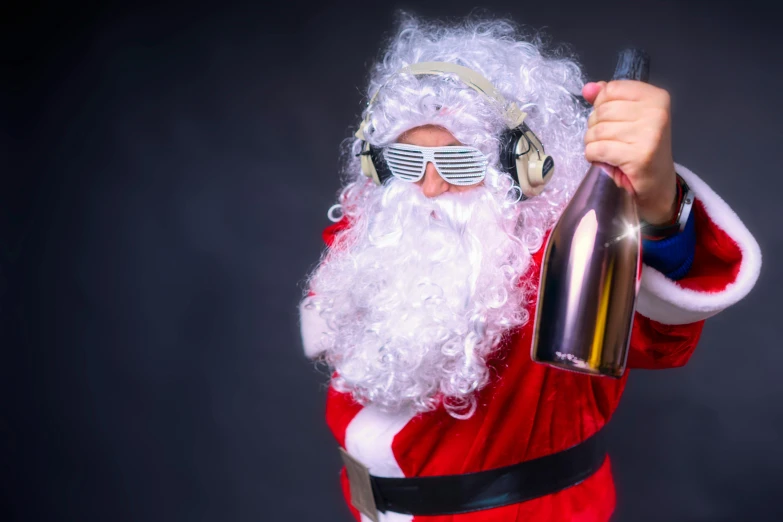 a santa with a bottle of wine wearing sunglasses and santa hat