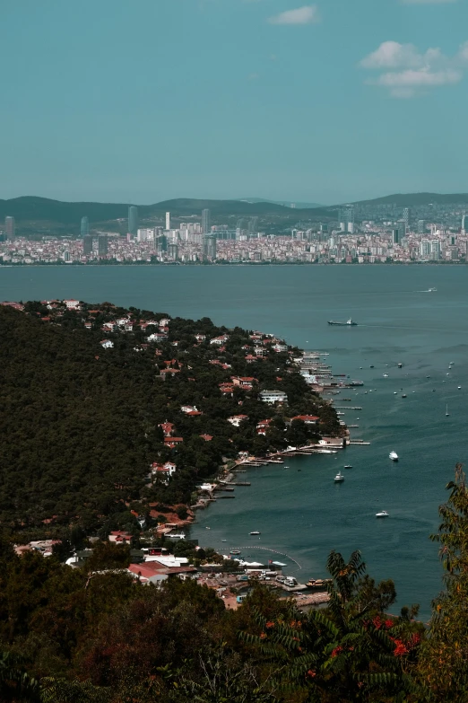 a hill that has some boats in the water