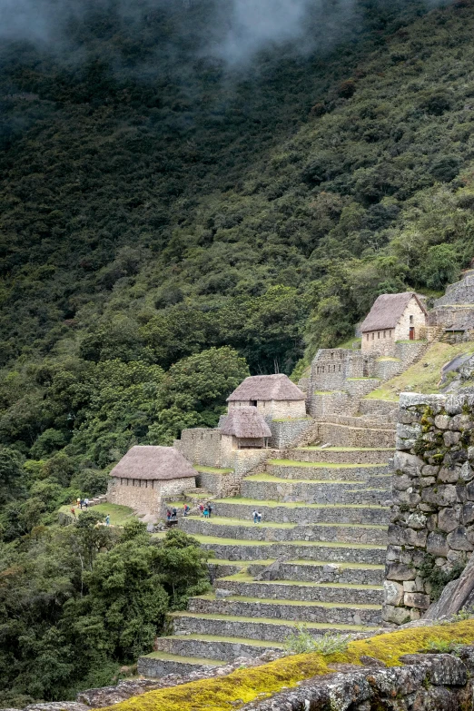 the steps of machal village leading to a well - built house