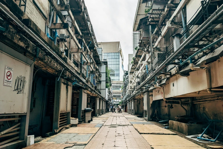 street with various buildings and scaffoldings in the alley