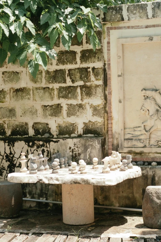 the statues are in an old outdoor area