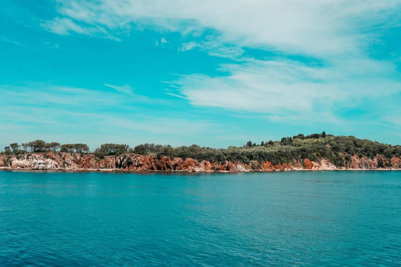 a small island in the middle of a body of water