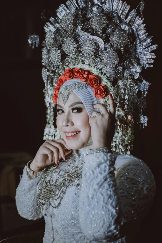 a woman with elaborate jewelry in a costume