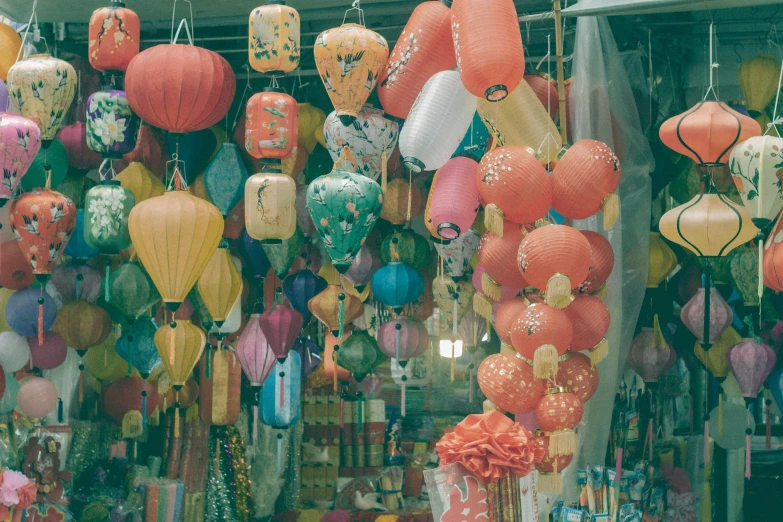 lanterns on display in the outdoor market for sale