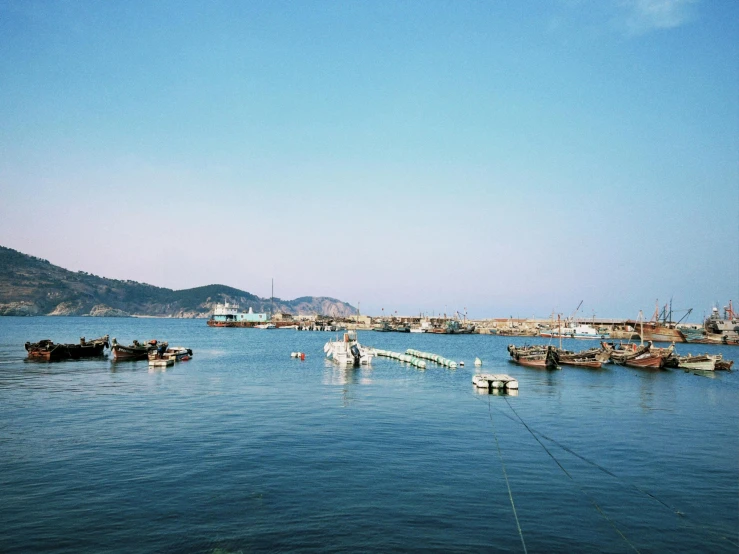 a view of boats floating in the water