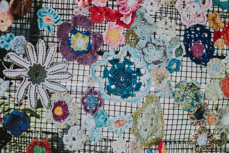 a number of small flowers on a fabric