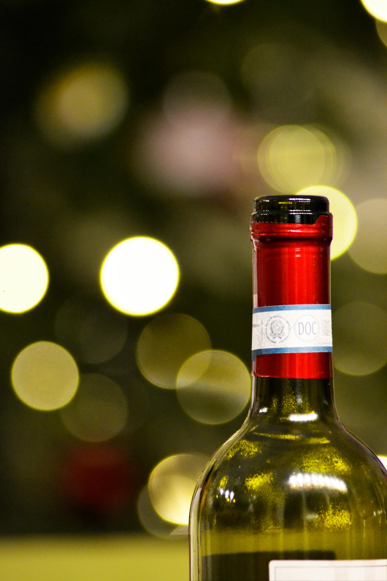 closeup of a bottle of white wine on the table