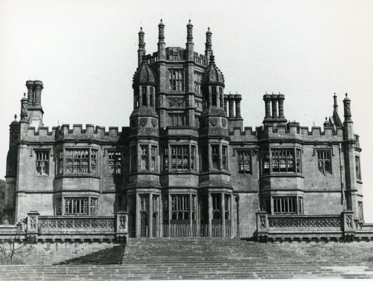 a black and white drawing of an old castle