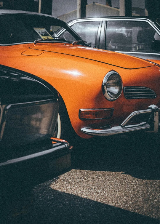 a car is parked near another car in the parking lot