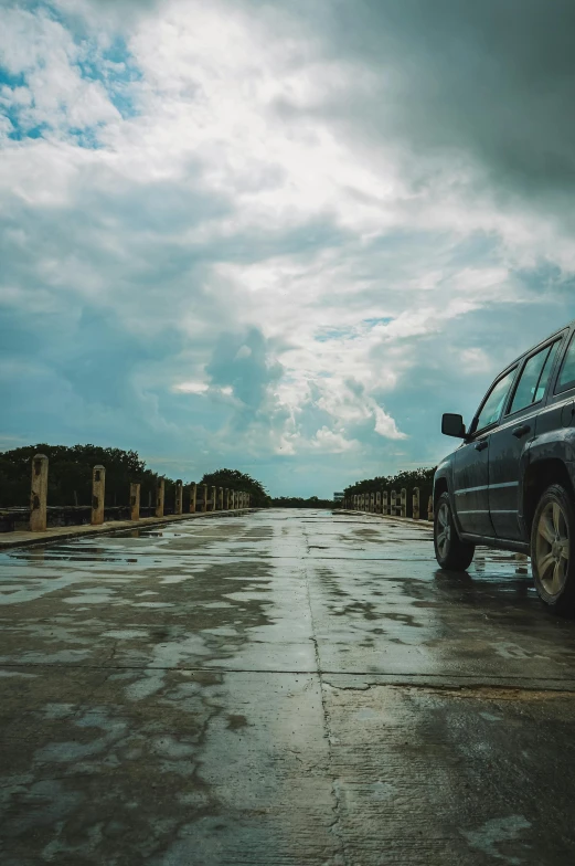 a vehicle parked in an empty parking lot