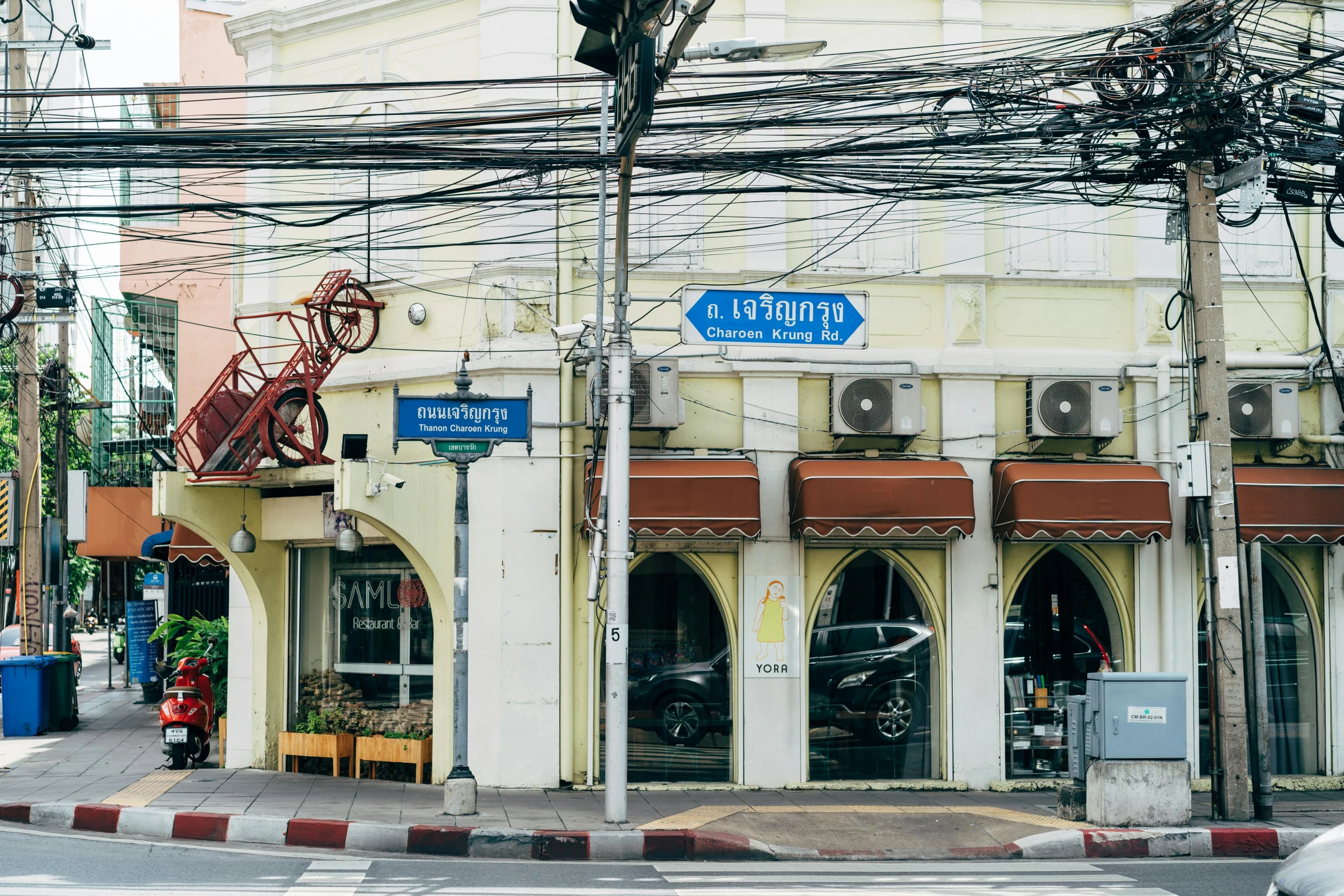 a building with a street sign in front of it