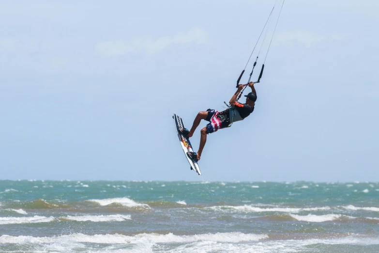 the person is enjoying their kite board trip