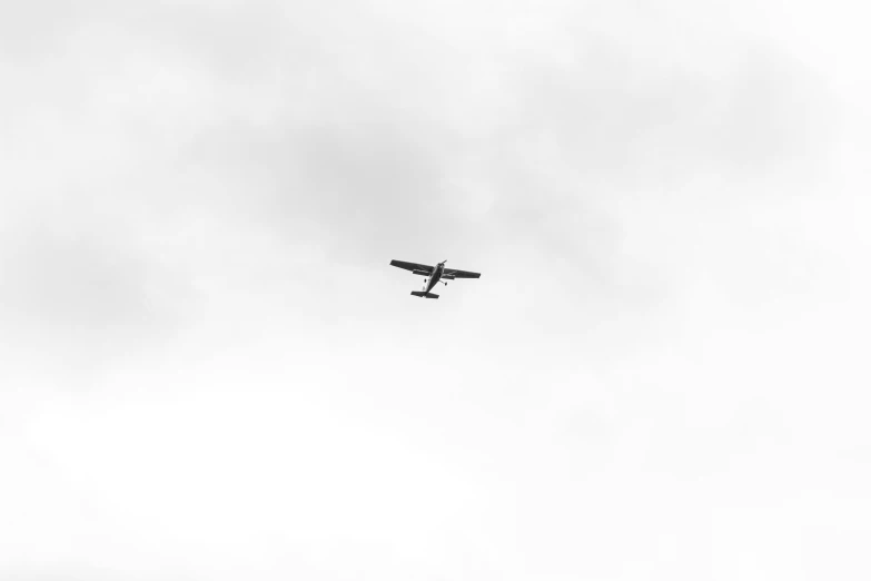 an airplane flying in the sky at high speed