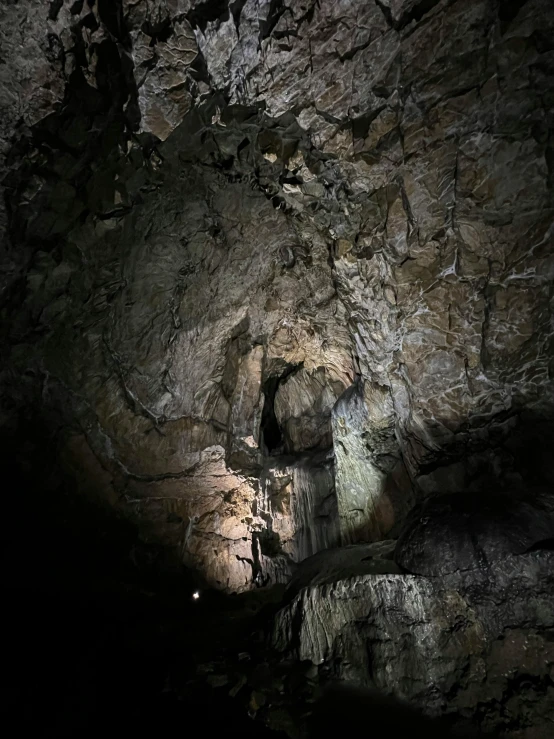 a cave with light coming from it