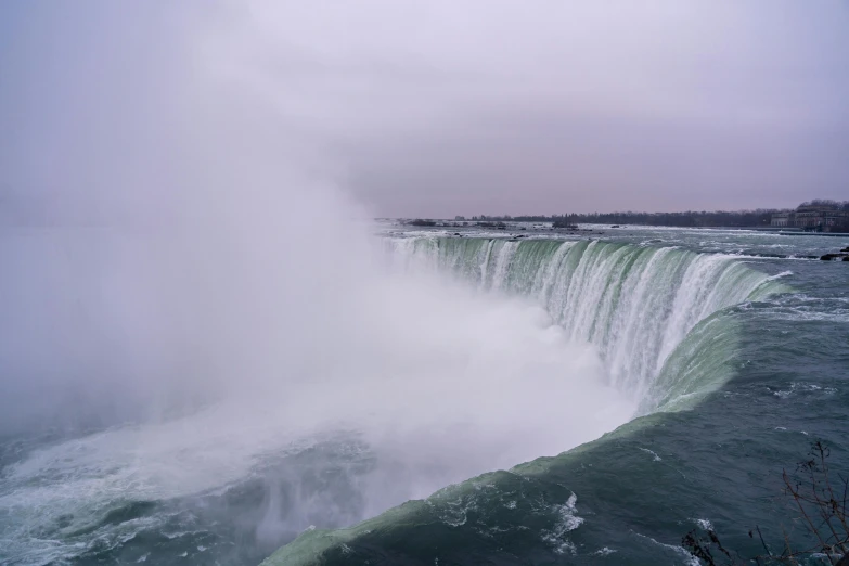 a big waterfall that is being hed by some water