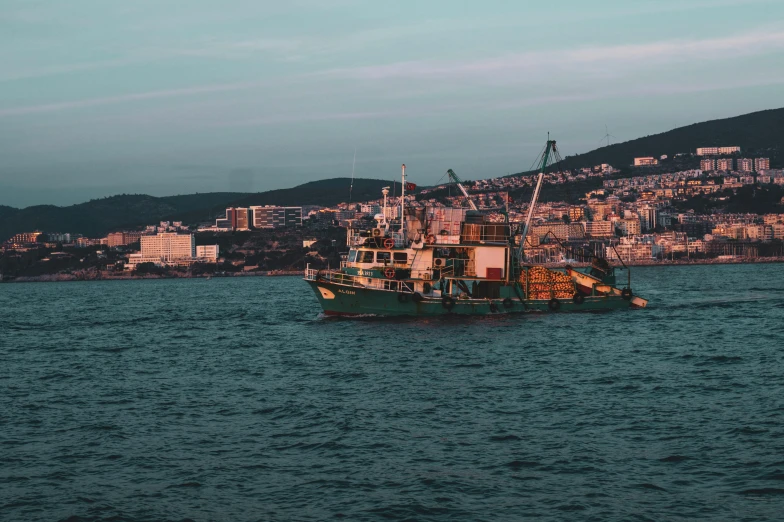 a large fishing boat out in the water